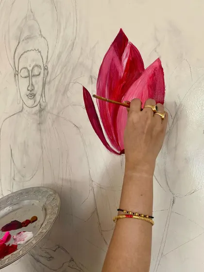Here’s a look at my process. I always start by sketching the design directly onto the wall, which allows you to see the composition in its actual scale before I begin painting with professional-grade acrylics.