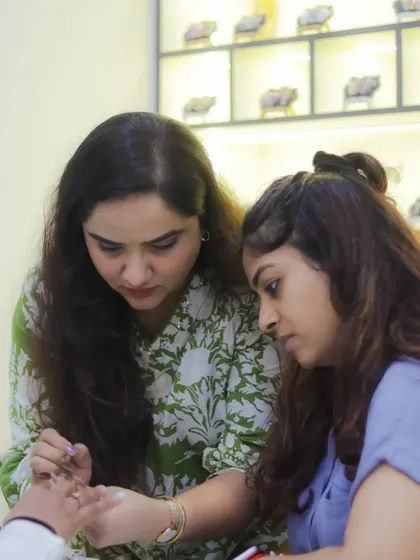 Our founder, Dipika Parihar, providing personalized feedback to a student. This direct mentorship is an invaluable part of the learning experience at our academy.