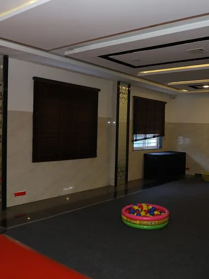 A dedicated "Colour Sort" activity area with a ball pit, designed to provide a safe and engaging play space for young children at the Klay Pre School event.
