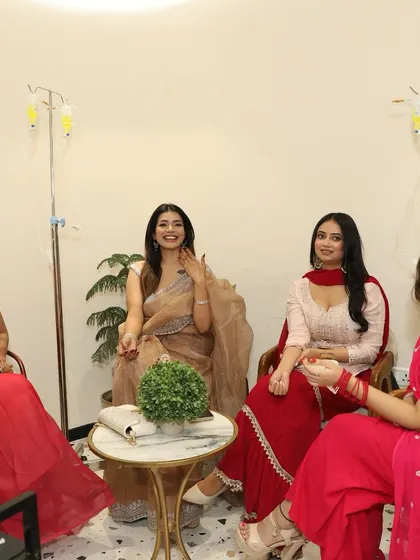 A group of friends getting their pre-Diwali glow-up together. IV therapy can be a shared wellness experience.