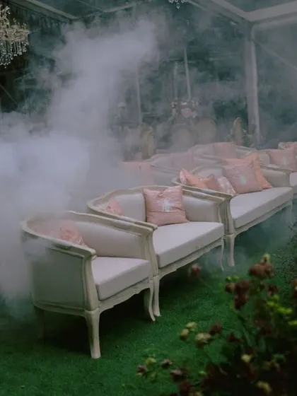 The calm before the storm. We used fog to create a dreamy, ethereal atmosphere before the start of the ceremony, building anticipation for the magic to come.