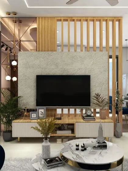 This living room combines a concrete-finish TV panel with a wooden slatted partition, creating a modern yet warm aesthetic. The layout is optimized for comfort and conversation, with plush seating and curated decor pieces.