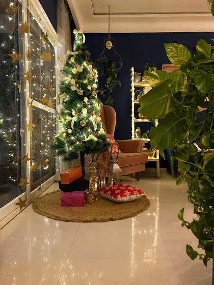 Another view of my Christmas setup. The star-shaped lights on the window add an extra touch of magic.