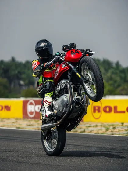 A perfect wheelie is a display of balance and throttle control. We execute classic motorcycle stunts like this with consistency and safety, adding a core element of excitement to our shows.