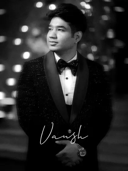 A dapper black and white portrait of groom Vansh at his ring ceremony.