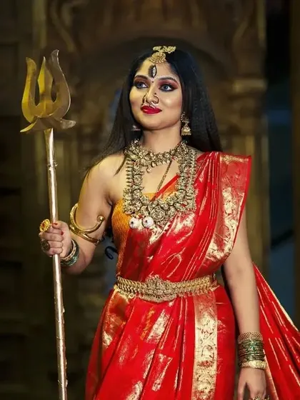 A powerful depiction of Goddess Durga, created for a Navaratri-themed photoshoot. We provided the grand temple jewellery to achieve this divine look.