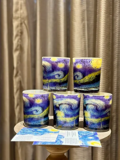 A closer look at the Starry Night candles. Each one is hand-painted and comes with a card explaining the artistic inspiration behind it.