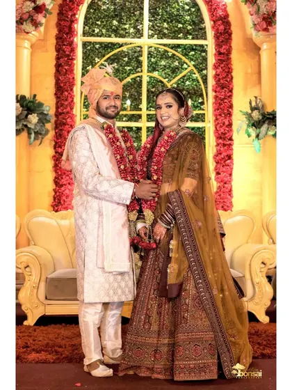 A classic portrait of the couple on their wedding stage.