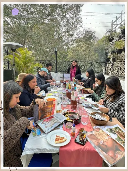 A wide view of a recent Vision Board Party. The atmosphere is always buzzing with conversation, creativity, and the shared goal of manifesting a beautiful future. Join us for the next one.