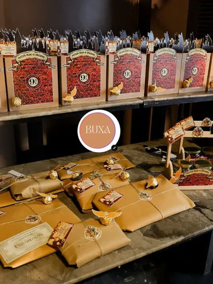 A full display of the Harry Potter themed hampers and wrapped gifts, perfect for a magical birthday party or as return favors.