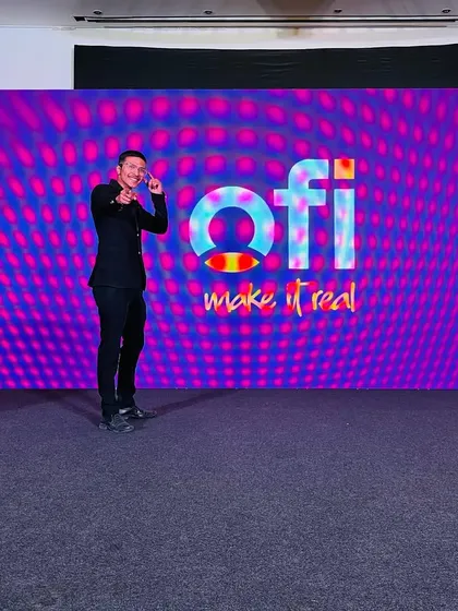 Pointing to a member of the audience during my OFI stage show. Interaction is key to making the magic feel personal and real.