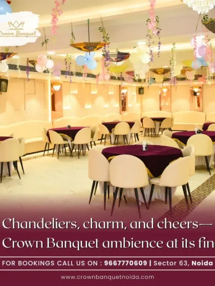 The ambiance of our hall is defined by its elegant details. Modern chandeliers cast a warm glow over the space, complemented by tasteful decor like hanging floral arrangements and colorful umbrellas, creating a charming and cheerful atmosphere for any party.