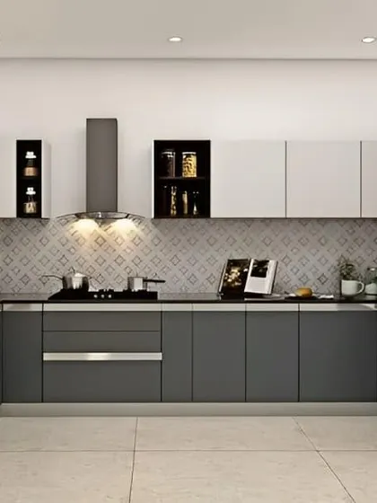 A dark grey and white U-shaped kitchen that feels very sophisticated. The patterned backsplash and open shelving nooks break up the solid cabinet fronts and add visual interest.