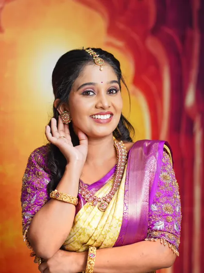 This shot captures the grace and charm of the model in her traditional attire.