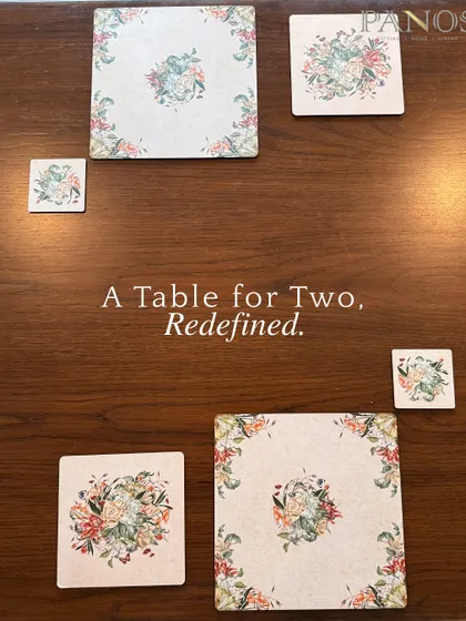 A table for two, redefined. This flat lay showcases our coordinated floral collection, including placemats and coasters in various sizes, designed to bring a touch of botanical elegance to your table.