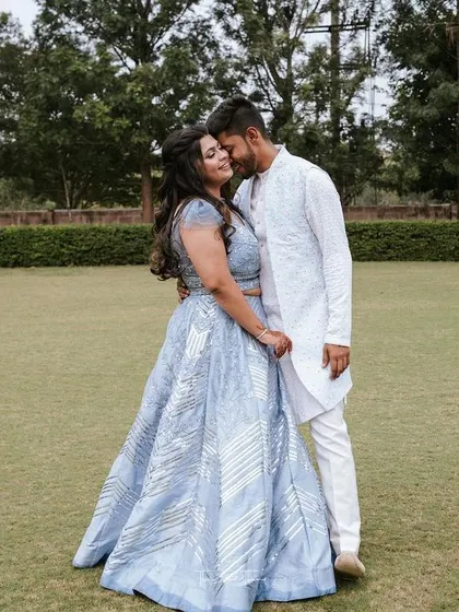 A candid, romantic shot from our engagement photoshoot. We believe the best moments are often the unscripted ones that happen between the dance steps.