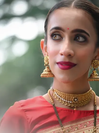 A classic portrait from the jewelry campaign, with the model looking off-camera.