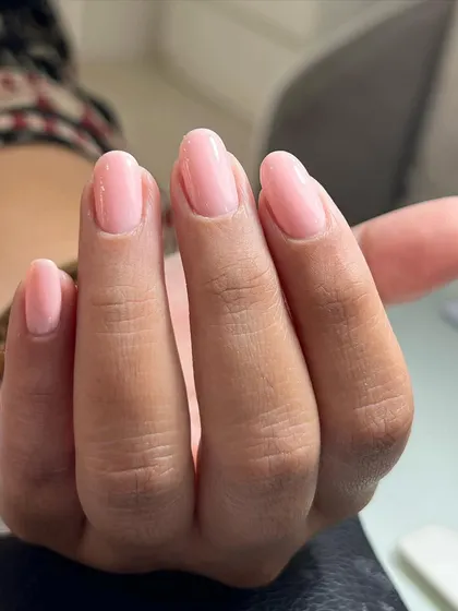 The result of a perfect Russian manicure and a simple gel overlay. Notice how clean the cuticle line is, allowing the color to be applied flawlessly for a polished, grown-out look.