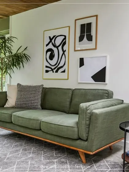 We also help select the perfect furniture, like this mid-century modern sofa in olive green, which adds a touch of retro charm and comfort to any living space.