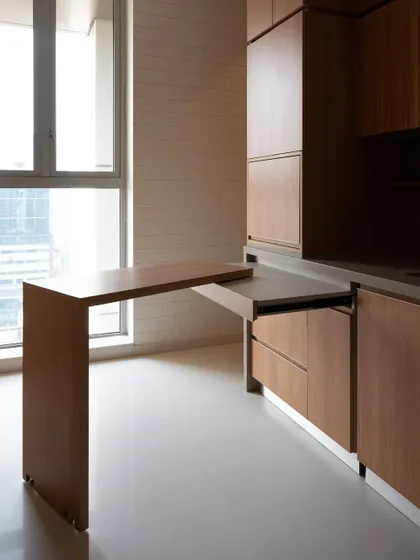 This swivel table is the ultimate flexible solution for compact spaces. It pulls out to provide extra counter space for prep or a small dining spot, and then tucks away neatly, demonstrating how good design can adapt to your needs.