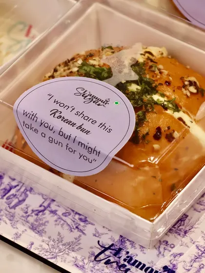 "I won't share this Korean bun with you, but I might take a gun for you." We love adding these quirky, heartfelt notes to our Rakhi hampers to capture the unique bond between siblings.