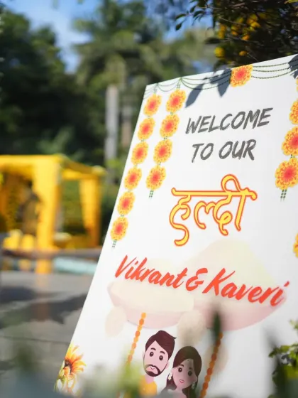 A welcome sign for a Haldi ceremony with Hindi text, adding a traditional and personal touch to the event entrance.
