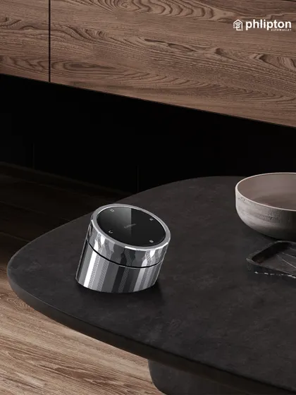 This premium metal wireless knob is a perfect example of form meeting function. Placed on a coffee table, it offers a sophisticated and convenient way to control your home's automated scenes without needing a phone or wall panel.