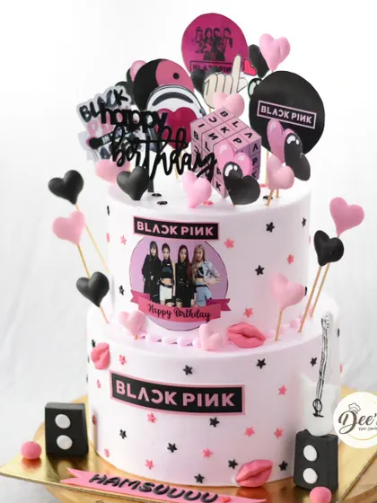 Another view of this popular K-pop themed cake, ready to be the center of a fan's birthday party.