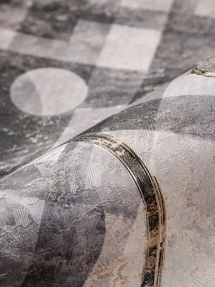 A bold, abstract geometric wallpaper in monochrome tones. The mix of circles, lines, and textures creates a dynamic and artistic statement piece for your walls.
