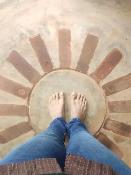 Grounding oneself is a vital part of the creative process. The floor of this home features a sunburst pattern made of brick inlay, a small, tactile detail that connects the inhabitant to the earth with every step.