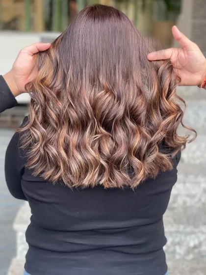 A beautiful cool brown balayage. The cool tones offer a sophisticated alternative to warmer brunettes, and I share the exact shades used here.
