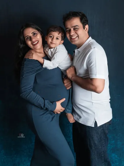 A full family portrait filled with smiles and love. It’s so important to capture these moments as a family of three before you become a family of four.