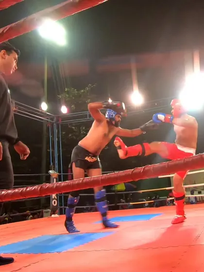 A kick is blocked during Vipul's silver medal match. A great display of defensive skills.