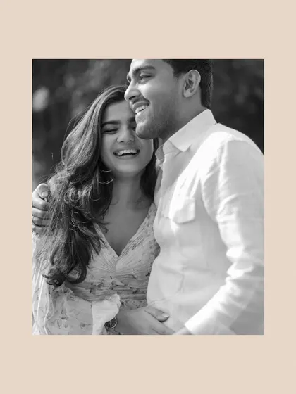 A moment of shared laughter, made even more impactful in black and white. It's a perfect example of how monochrome can amplify the authenticity of an emotion.