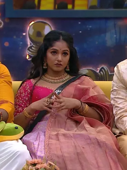 Bhavya looking thoughtful and elegant in her traditional attire.