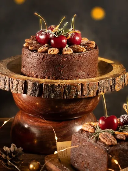 A beautifully staged photo of the artisanal rich fruit cake from my Christmas workshop. Learn to create this festive centerpiece, perfect for holiday celebrations.