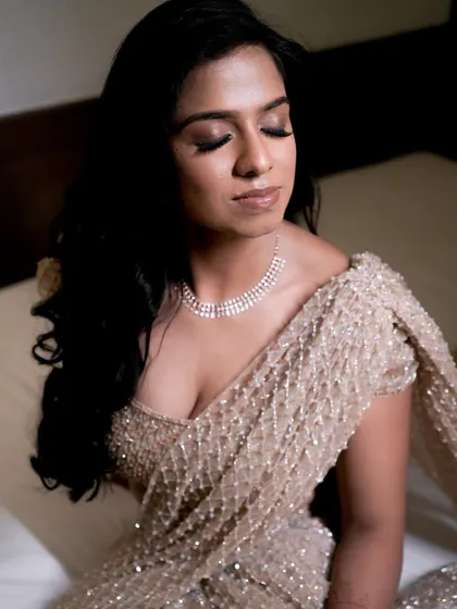 A close-up of the reception makeup, showing the beautiful shimmer and flawless skin.