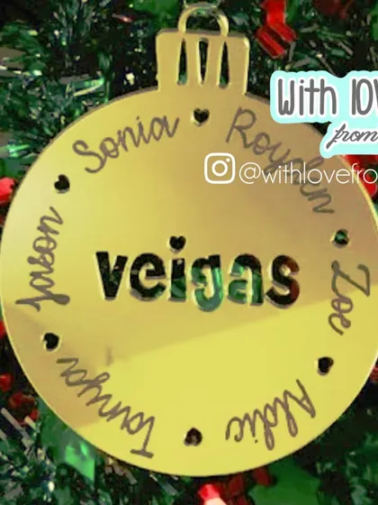 This family ornament proudly displays your family name in the center, surrounded by the names of each family member. It's a wonderful way to represent your whole family on the Christmas tree.