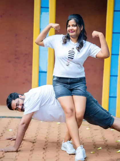 A fun and quirky pre-wedding photo showing the couple's playful side.