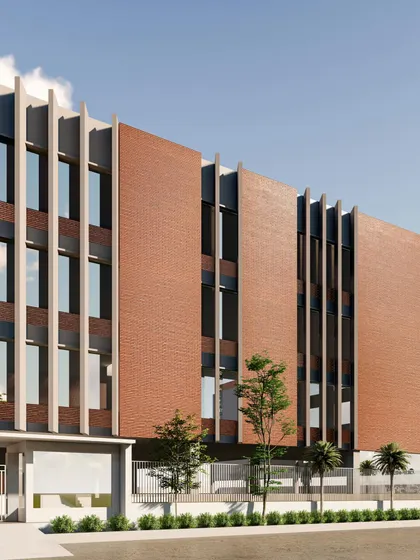 This angled view of the industrial unit's rendering shows the rhythmic pattern of the vertical louvers. This design element is crucial for breaking up the building's mass and providing essential shading for the west-facing wall.