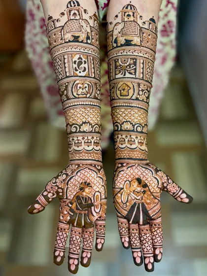 A stunning bridal design with portraits of the couple. The groom is shown with a sword, and the bride is depicted in a classic pose, surrounded by intricate details.