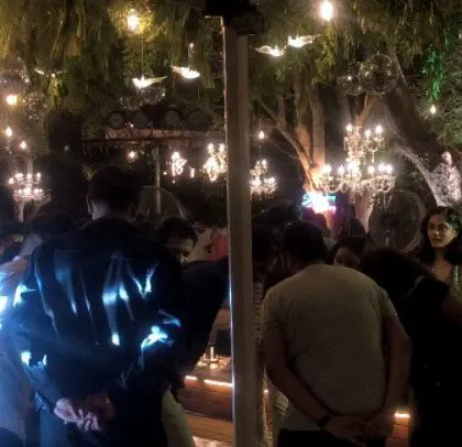 A darker, more intimate shot of the wedding party.