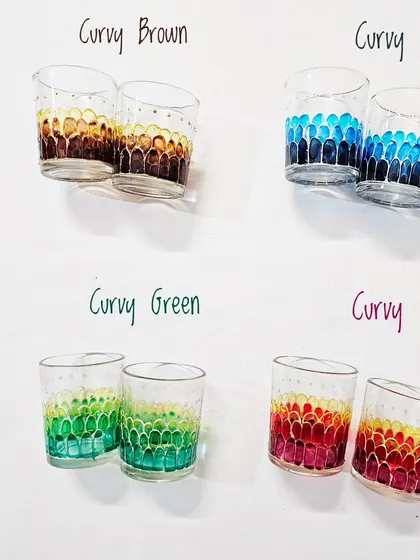 Here are the four color options for the 'Curvy' design tea light cups: Brown, Indigo, Green, and Rose. They are perfect for mixing and matching.