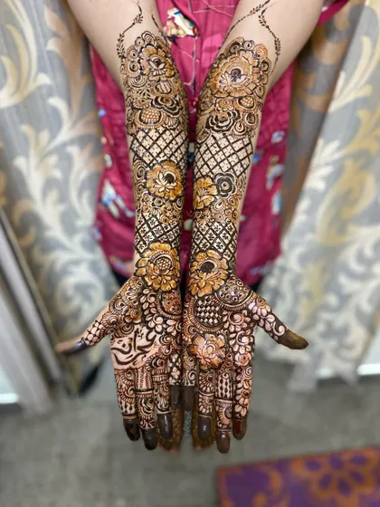 This is a detailed view of my intricate bridal henna work. Each design is unique, combining traditional patterns like paisleys and mandalas with fine-line fillers to create a stunning, full-coverage look for your special day.
