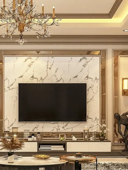 Classic elegance defines this living room's media wall. We used traditional wall molding, a marble TV backdrop, and a crystal chandelier to create a timeless and sophisticated entertainment space.