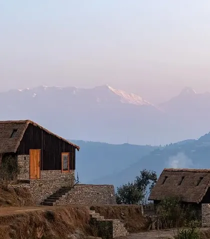 Our guesthouses in Uttarakhand are designed to feel like a natural extension of the Himalayan terrain. We used locally sourced stone and thatch for the roofs, creating simple, elegant structures that sit gently on the land, offering unobstructed views of the Panchachuli peaks.