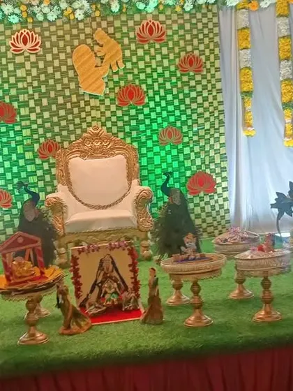 A simple yet elegant gift display for a function. The green and white theme of the backdrop is carried through to the artificial grass on the table, creating a fresh and natural look.
