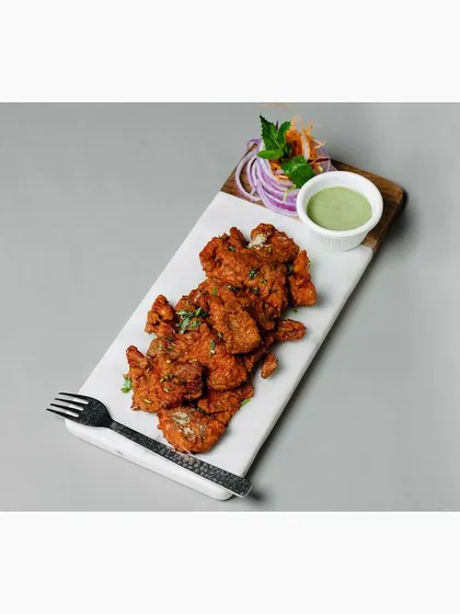 An overhead angle of the same fried chicken platter. Providing multiple angles like this is crucial for e-commerce, giving customers a complete view of the product.