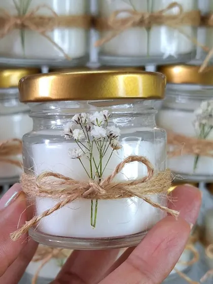 These mini jar candles are a great pocket-friendly addition to any hamper. For this order, I added a rustic touch with a jute bow and a sprig of dried baby's breath.