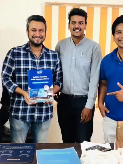 Our team with a group of customers, all smiles after a successful consultation.